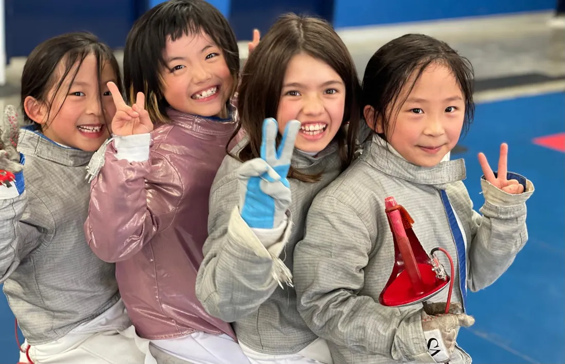 Young fencers smiling at Sydney Academy of Fencing
